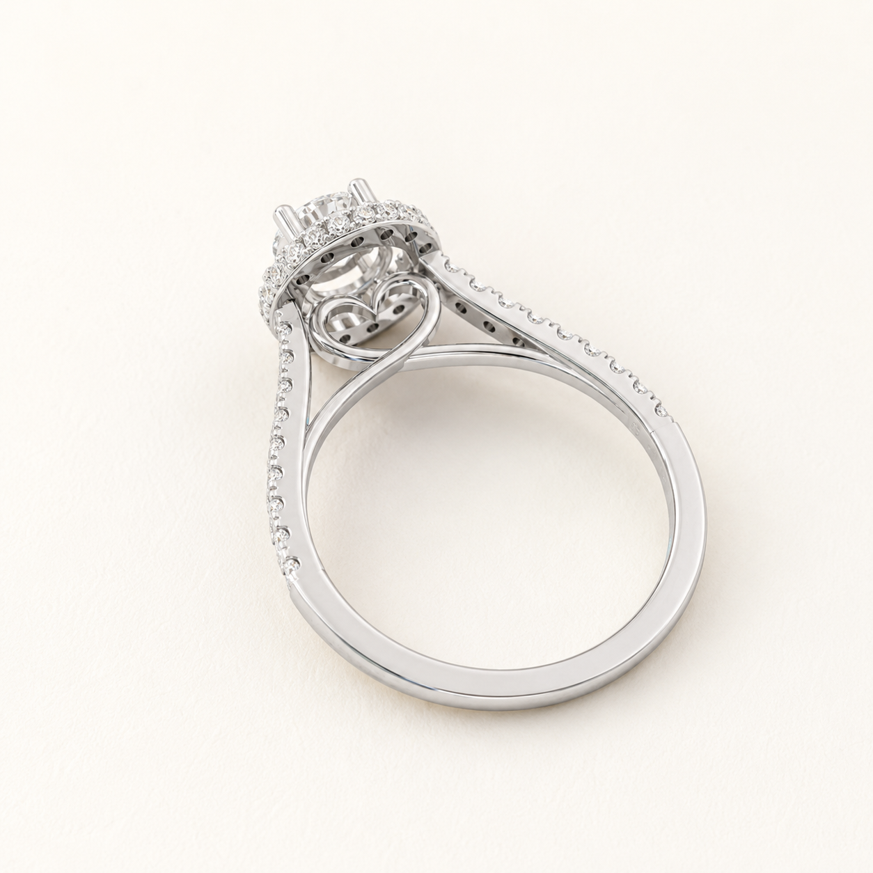 0.650 CT Round Diamond Halo Ring in Yellow Gold, White Gold & Rose Gold - view 2