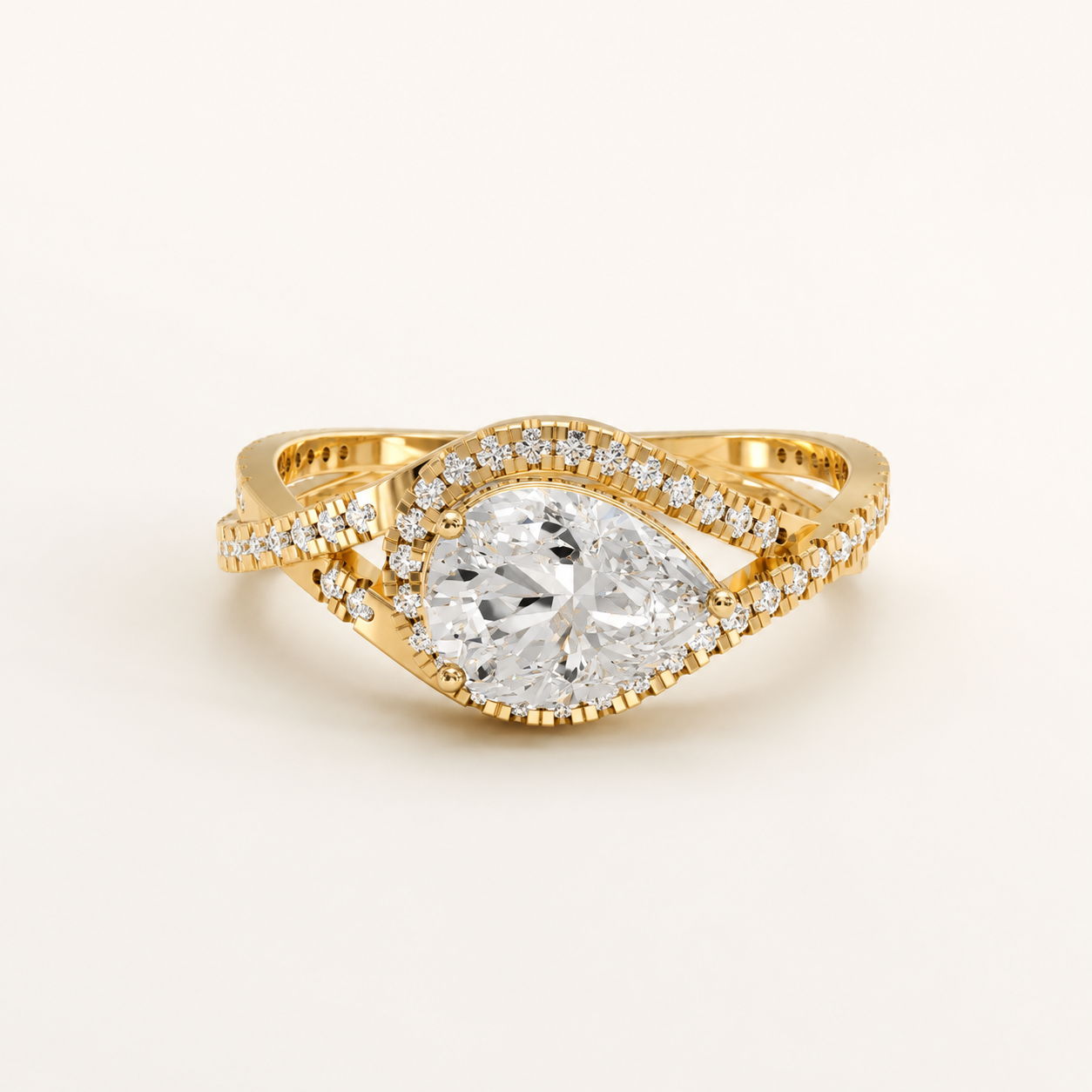 1.25 CT Pear Diamond Twisted Halo Ring in Yellow Gold, White Gold & Rose Gold