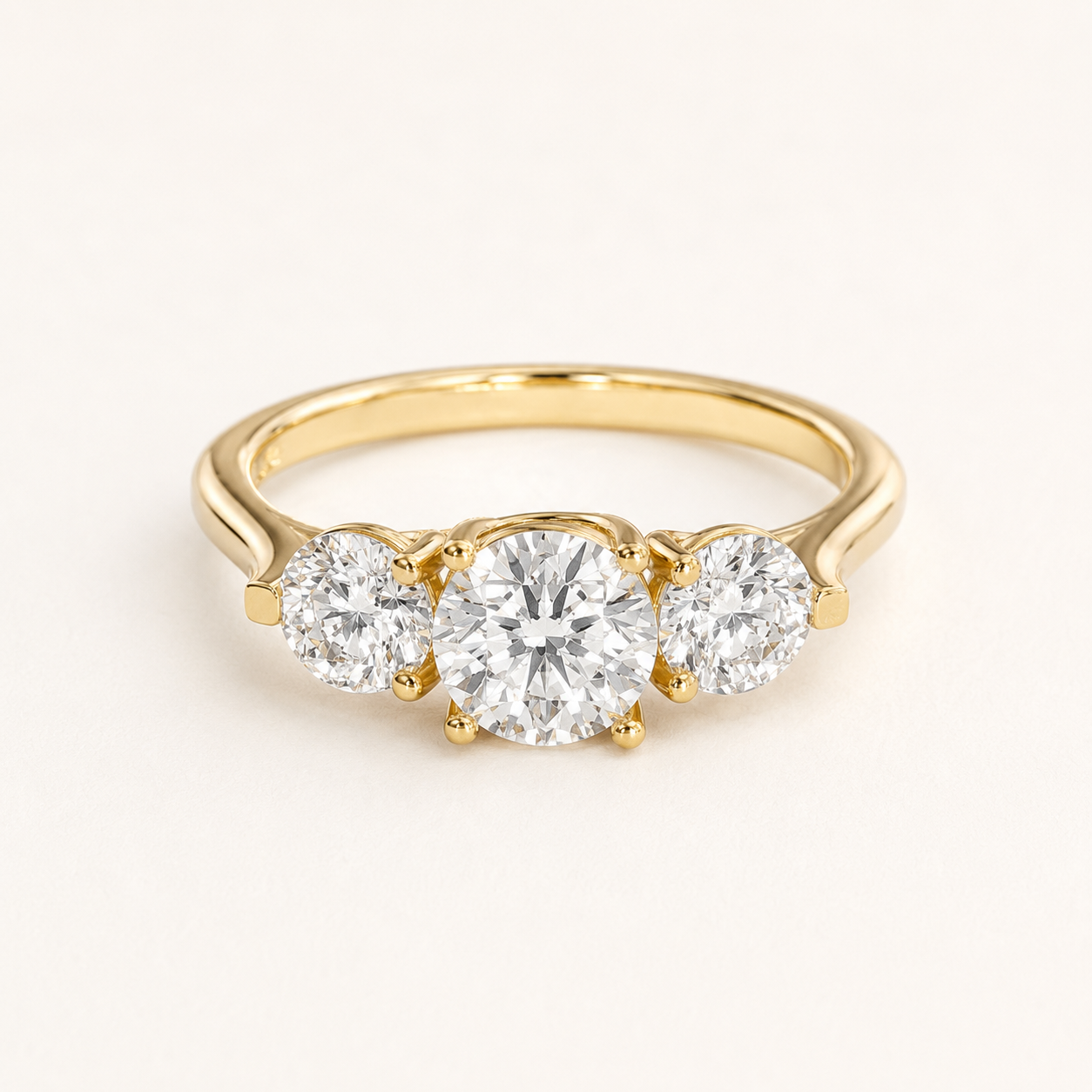 0.66 CT Round Diamond Three Stone Ring in Yellow Gold, White Gold & Rose Gold