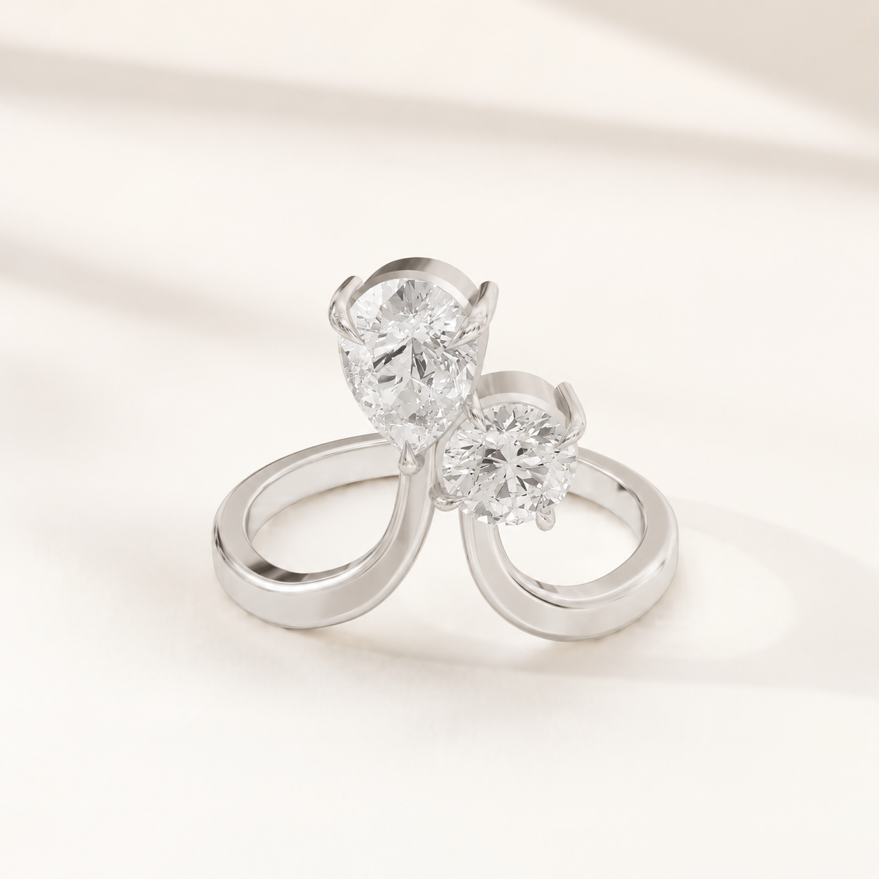 0.65 CT Pear & Round Diamond Bypass Ring in Yellow Gold, White Gold & Rose Gold