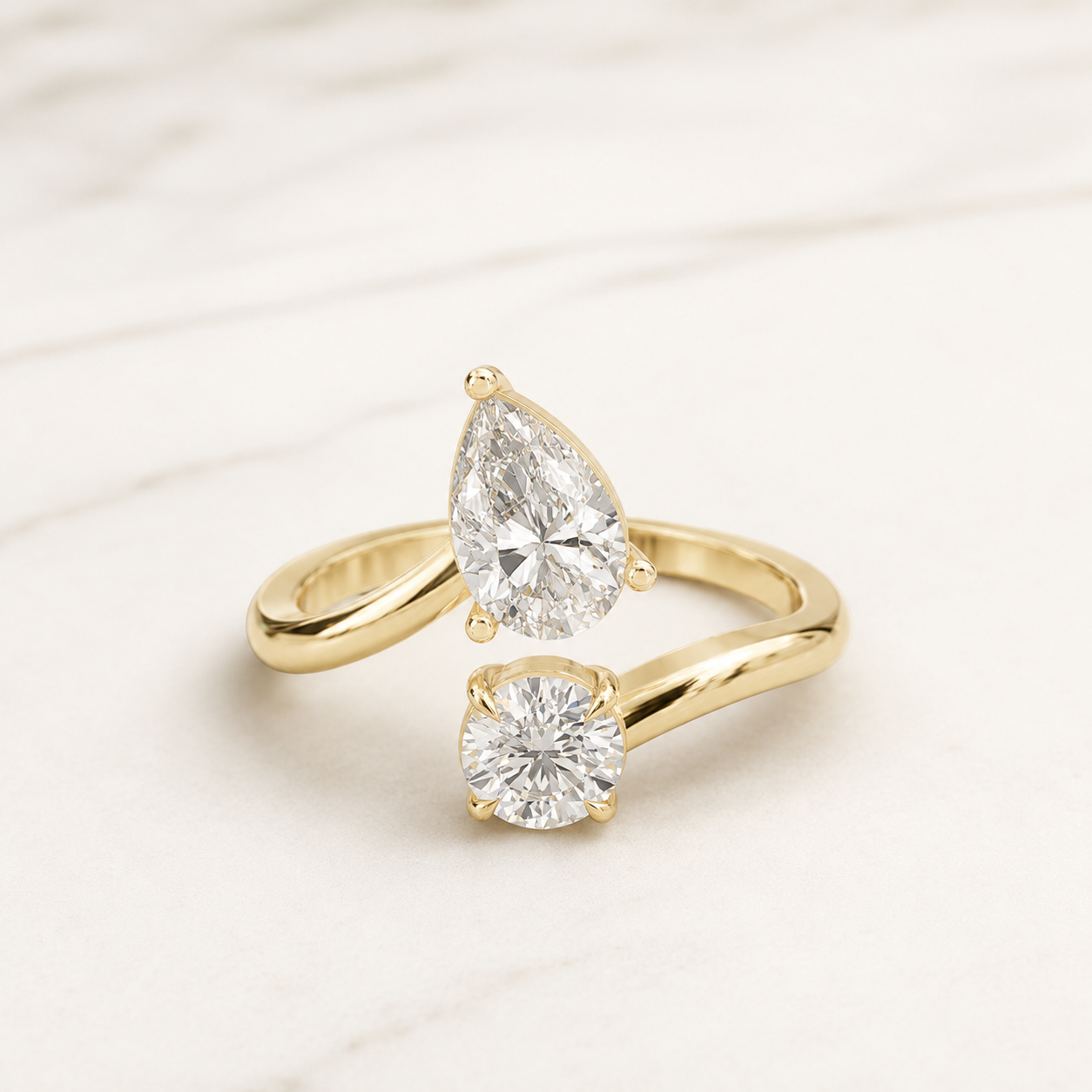 0.780 CT Pear & Round Diamond Bypass Ring in Yellow Gold, White Gold & Rose Gold