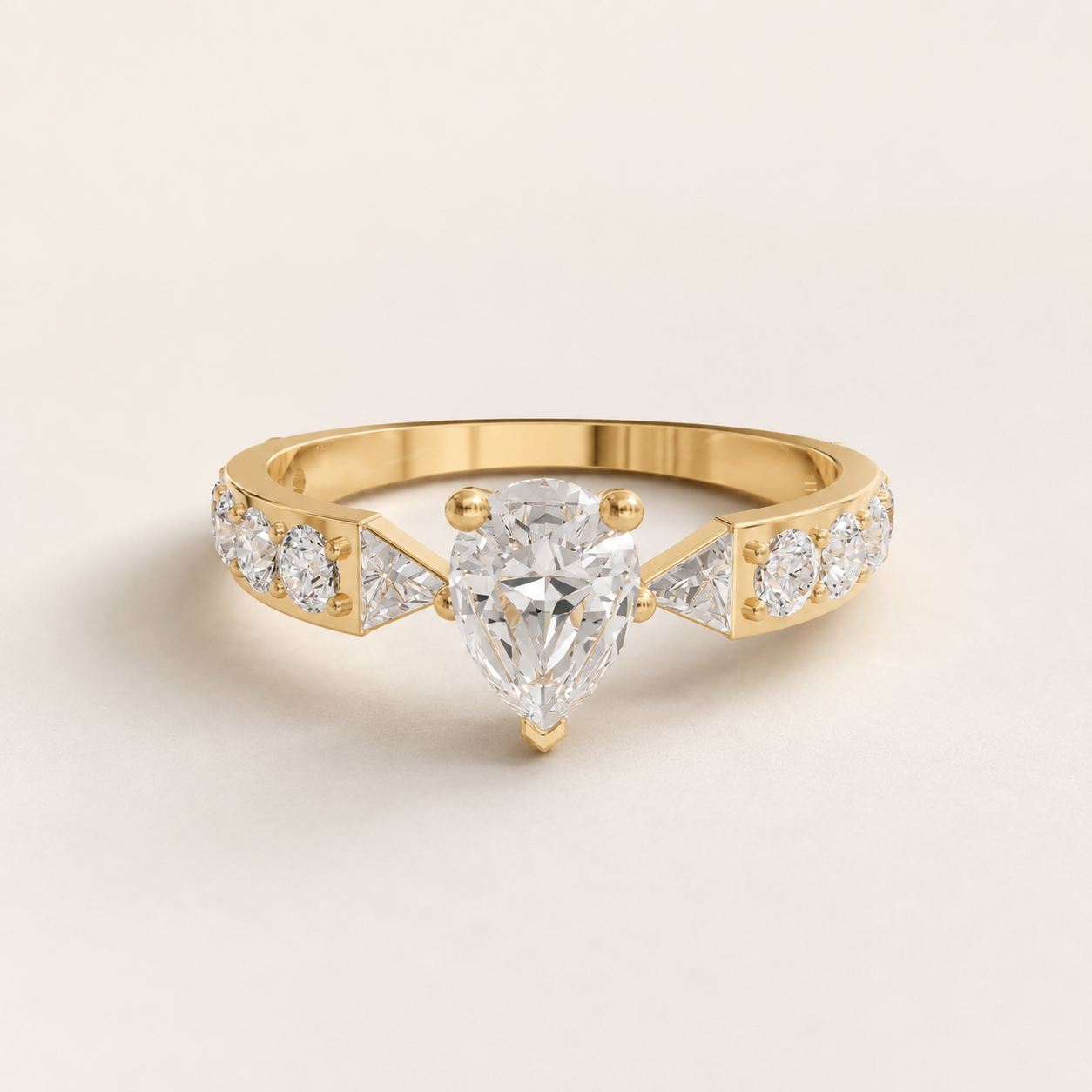 0.500 CT Pear Diamond Ring in Yellow Gold, White Gold & Rose Gold