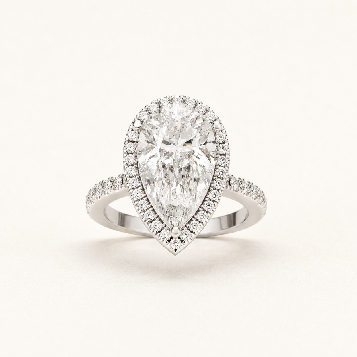4.35 CT Pear Lab-Grown Diamond Halo Ring in Yellow Gold, White Gold & Rose Gold