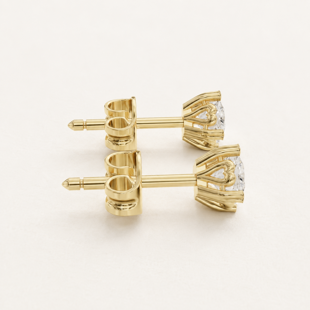 0.660 CT Round Lab-Grown Diamond Stud Earrings in Yellow Gold, White Gold & Rose Gold - view 2