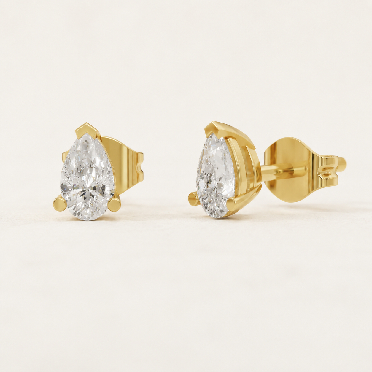 0.500 CT Pear Lab-Grown Diamond Stud Earrings in Yellow Gold, White Gold & Rose Gold