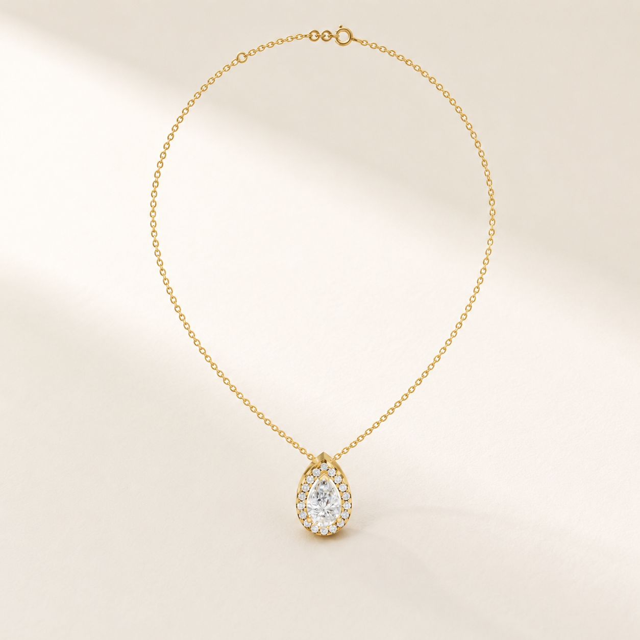 0.690 CT Pear Cut Lab-Grown Diamond Halo Pendant Necklace in White Gold, Yellow Gold & Rose Gold - view 2
