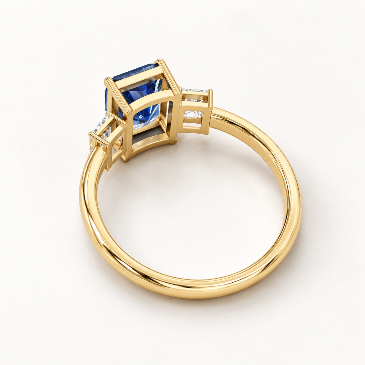 2.300 CT Blue Radiant Cut Lab Grown Diamond Three Stone Ring in White Gold, Yellow Gold & Rose Gold — product gallery image