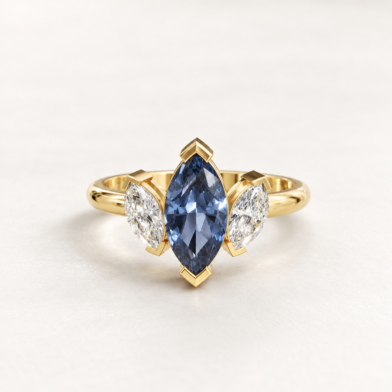 0.980 CT Marquise Blue Gemstone Diamond Three-Stone Ring in 9K, 14K & 18K Yellow Gold, White Gold & Rose Gold |