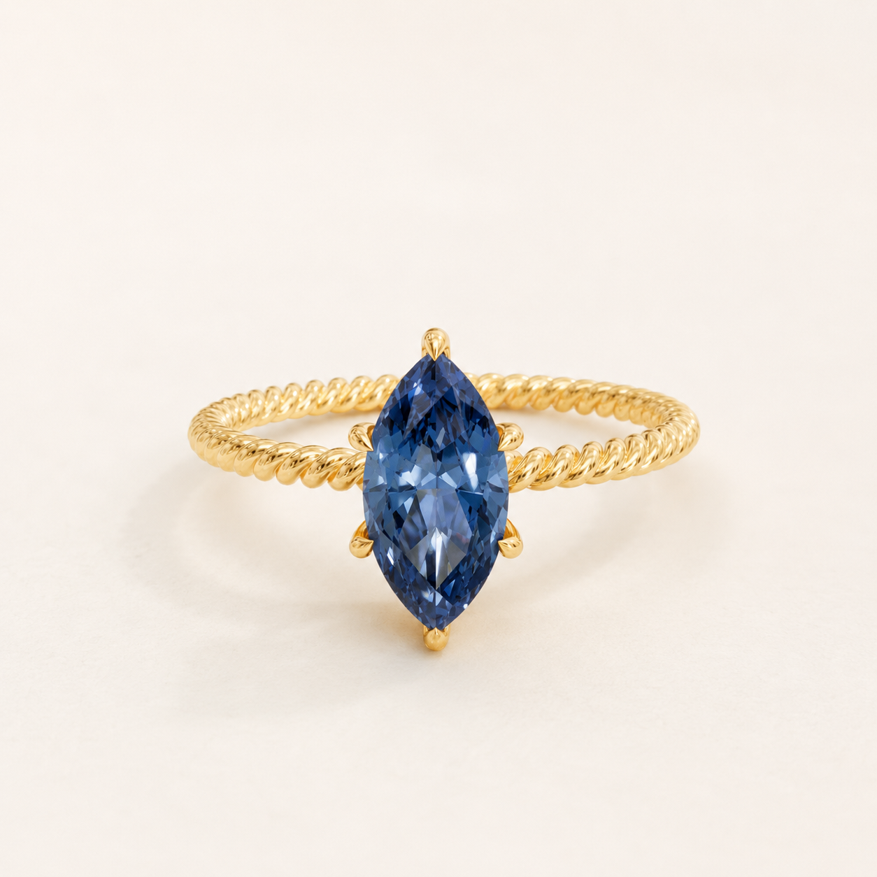 1.27 CT Blue Marquise Cut Solitaire Gemstone Ring in Yellow Gold, White Gold & Rose Gold | Twisted Band Engagement Ring – NyvaaraLuxe